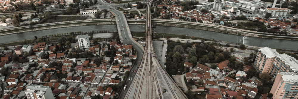 Thirty-three percent of North Macedonia’s carbon dioxide emissions come from the transportation sector, which is also responsible for thirty-seven percent of the country’s energy consumption (IEA 2024). The WeBa+ Program supported a comprehensive analysis of regional vehicle markets, covering fuel standards, electrification needs, and institutional frameworks. This analysis provided concrete recommendations for improving the carbon and environmental footprints of road vehicle fleets. These recommendations were then used to develop an emission reduction road map for North Macedonia’s transportation sector, which included measures for raising taxes on the highest polluting cars and modifying how the carbon dioxide emissions–related component of the motor vehicle tax was calculated. The road map was approved by the government via legislative actions, and its tax-related measure was supported by the North Macedonia Sustainability and Resilience Development Policy Operation.17 This reform is expected to increase North Macedonia’s motor vehicle tax revenue by 20 percent and reduce the sector’s GHG emissions. 17 World Bank Project ID P180587. Reducing the Environmental and Greenhouse Gas Emission Footprint of North Macedonia’s Transportation Sector North Macedonia—Skopje train and bus station from Mount Vodno