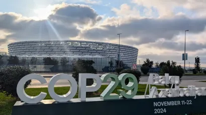 COP29 sign in front of stadium in Baku, Azerbaijan